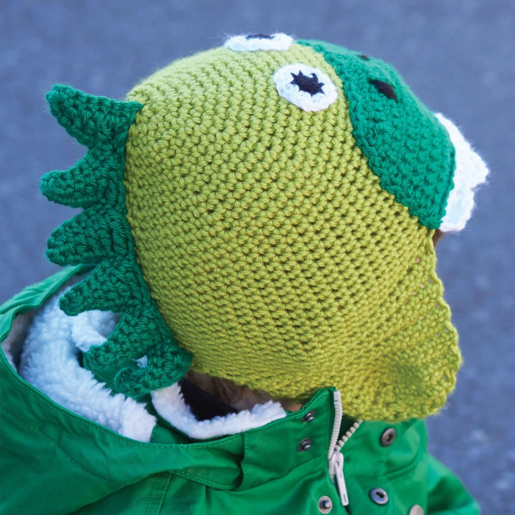 Free Crochet Pattern for a Kids Hatosaurus. Kids hat to crochet with dinosaur look.