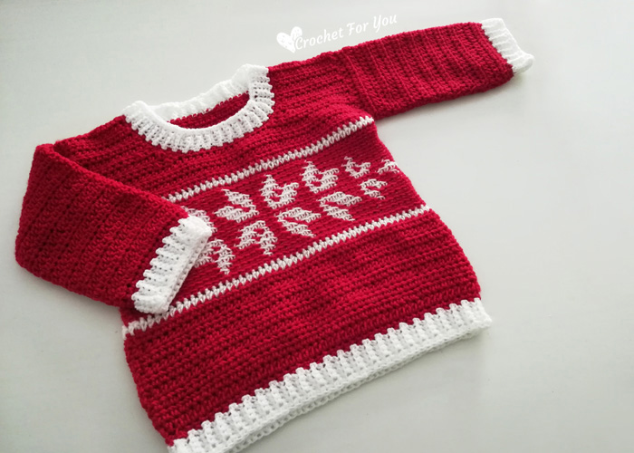 Free Crochet Pattern for a Winter Snowflake Baby Sweater 