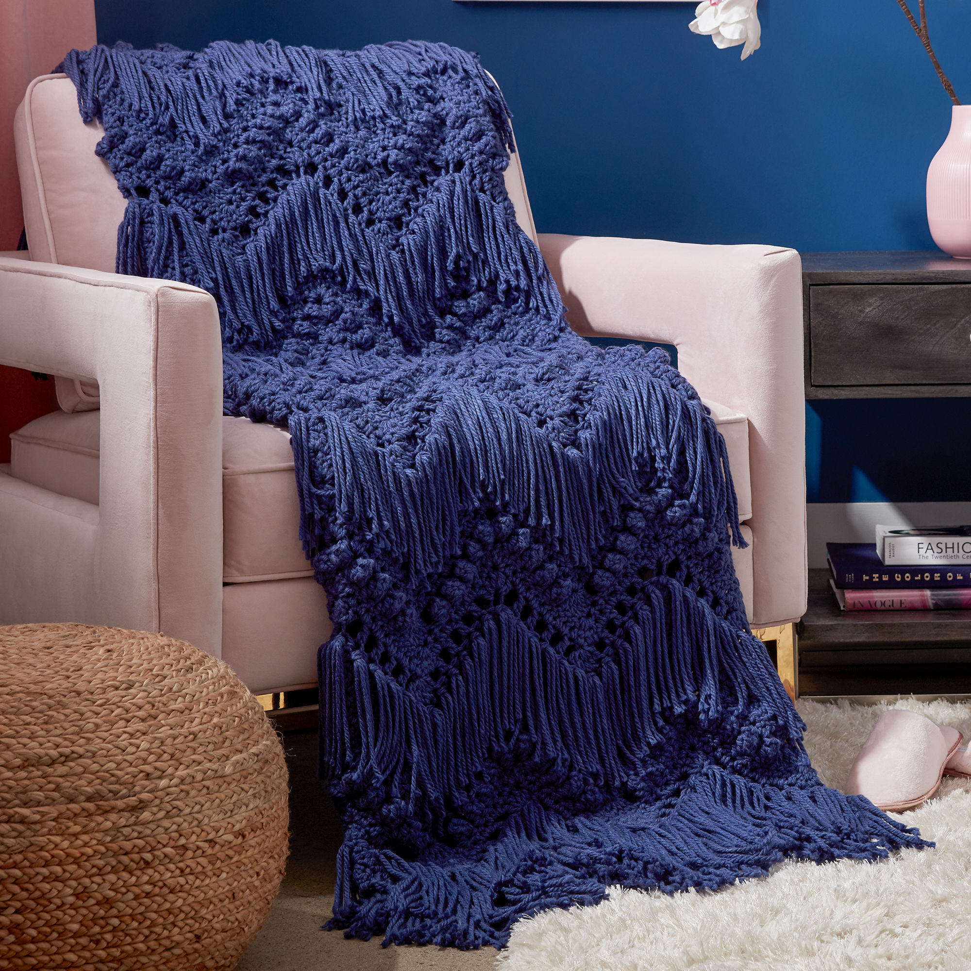 The classic crochet chevron motif gets a new look with bobbles and fringe